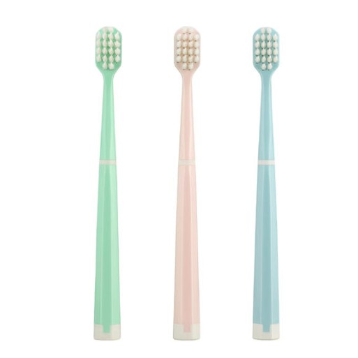 How does the design of this breathable soft-bristled wide-head toothbrush help increase brushing efficiency and comfort?